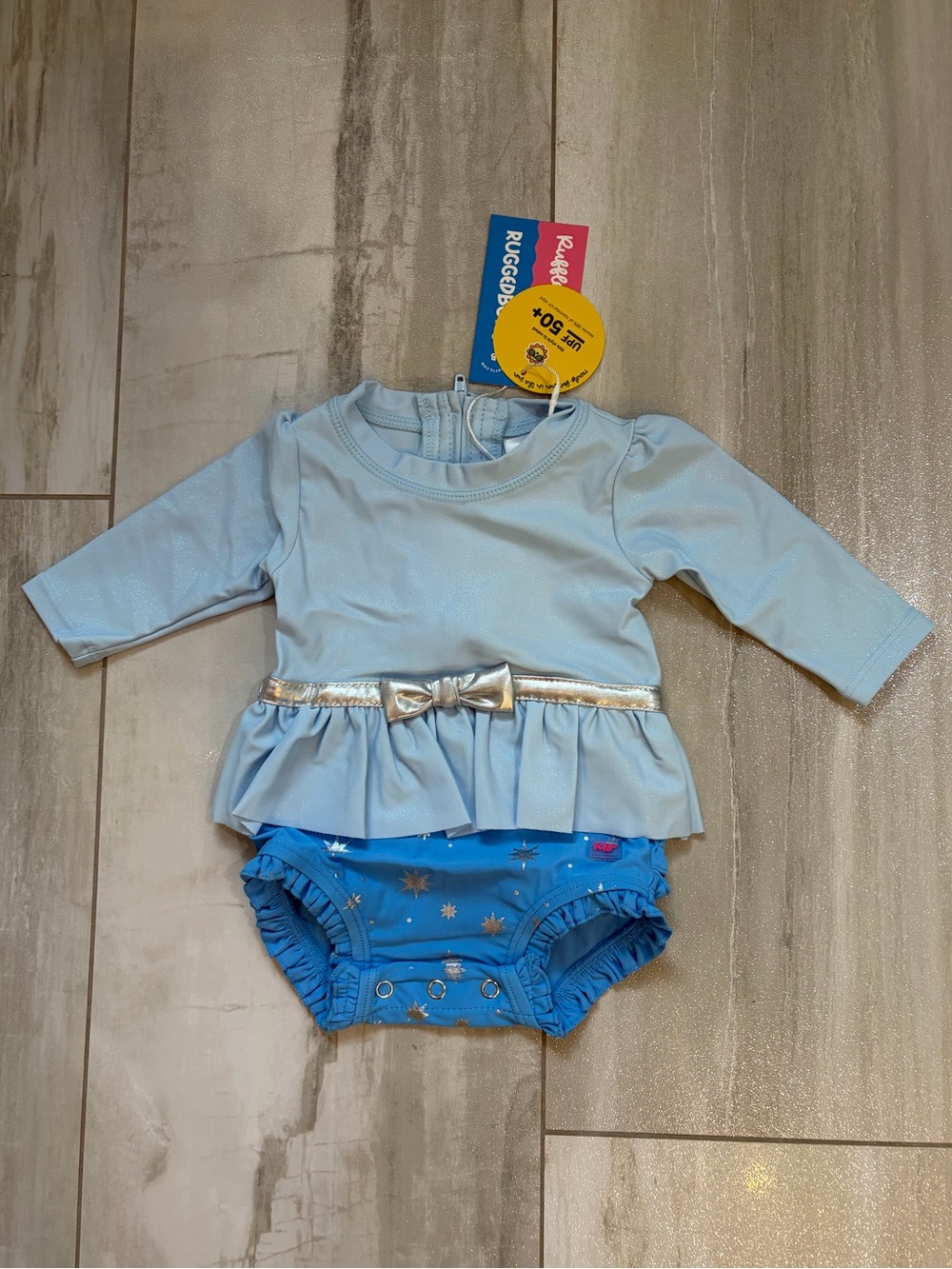NWT RuffleButts Blue Glass Slipper Princess Long Sleeve Rash Guard Swimsuit 0-3M